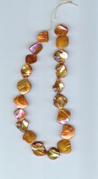 Billede: perler på snor ca. 40 cm, AB gul