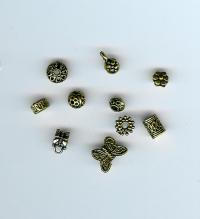Billede: metalperler guld store, 10 forskellige, ca. 200 stk.
